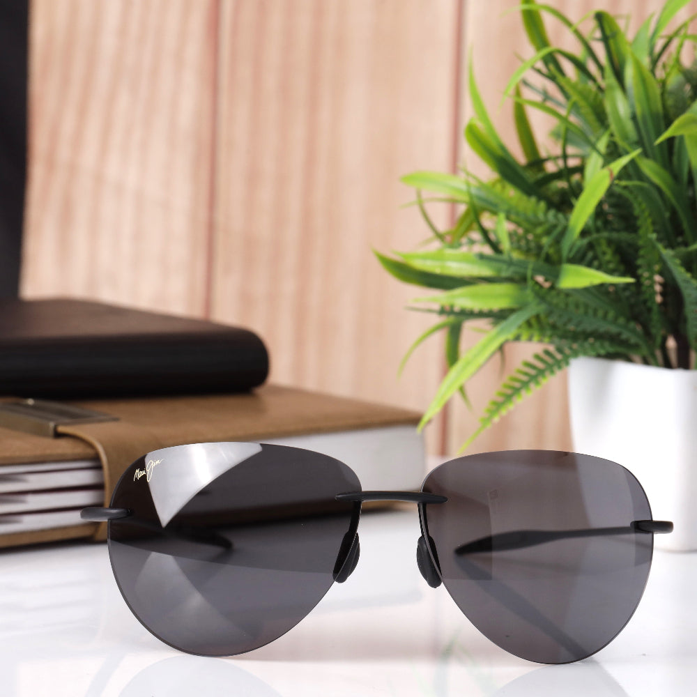 Maui Jim Sugar Beach MJ HT 421 sunglasses with black frame and UV 400 protected lenses. Unisex design, comfortable fit, perfect for all face shapes. Available now at JUO INDIA.